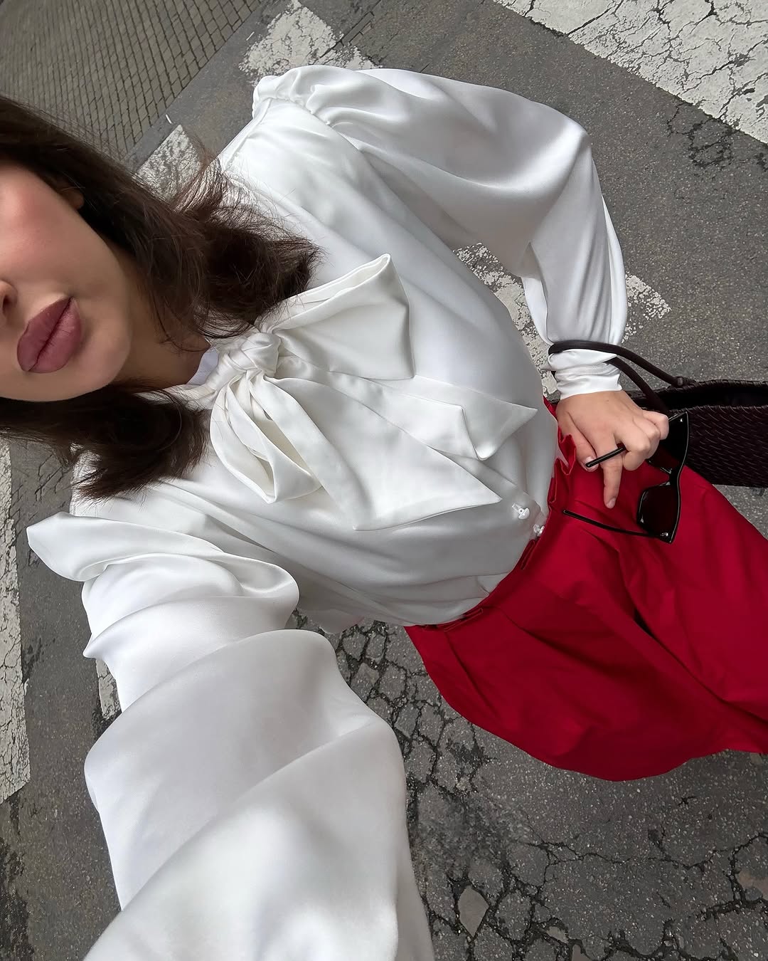 Blouse with accent shoulders and long sleeves with cuffs