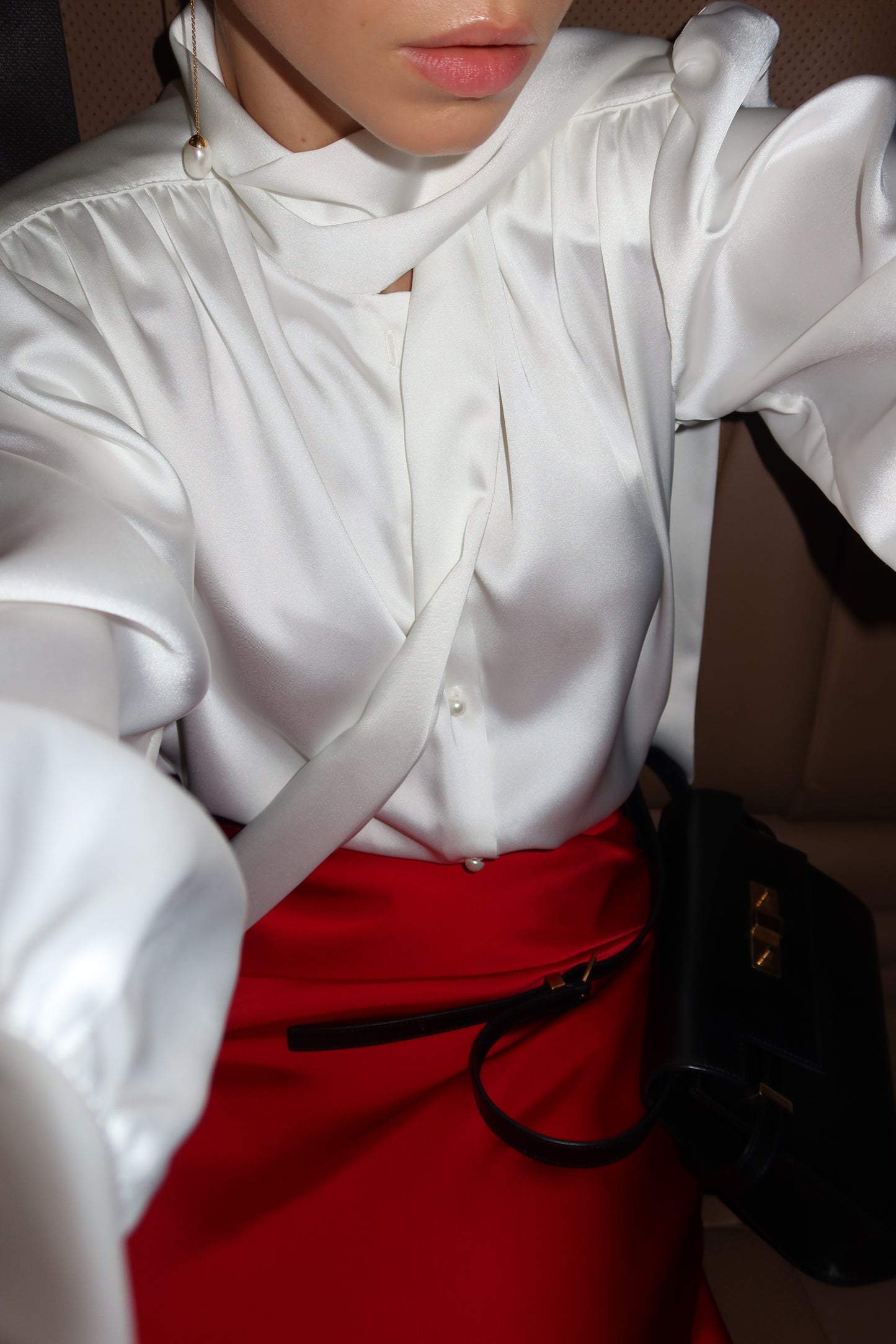 Blouse with accent shoulders and long sleeves with cuffs