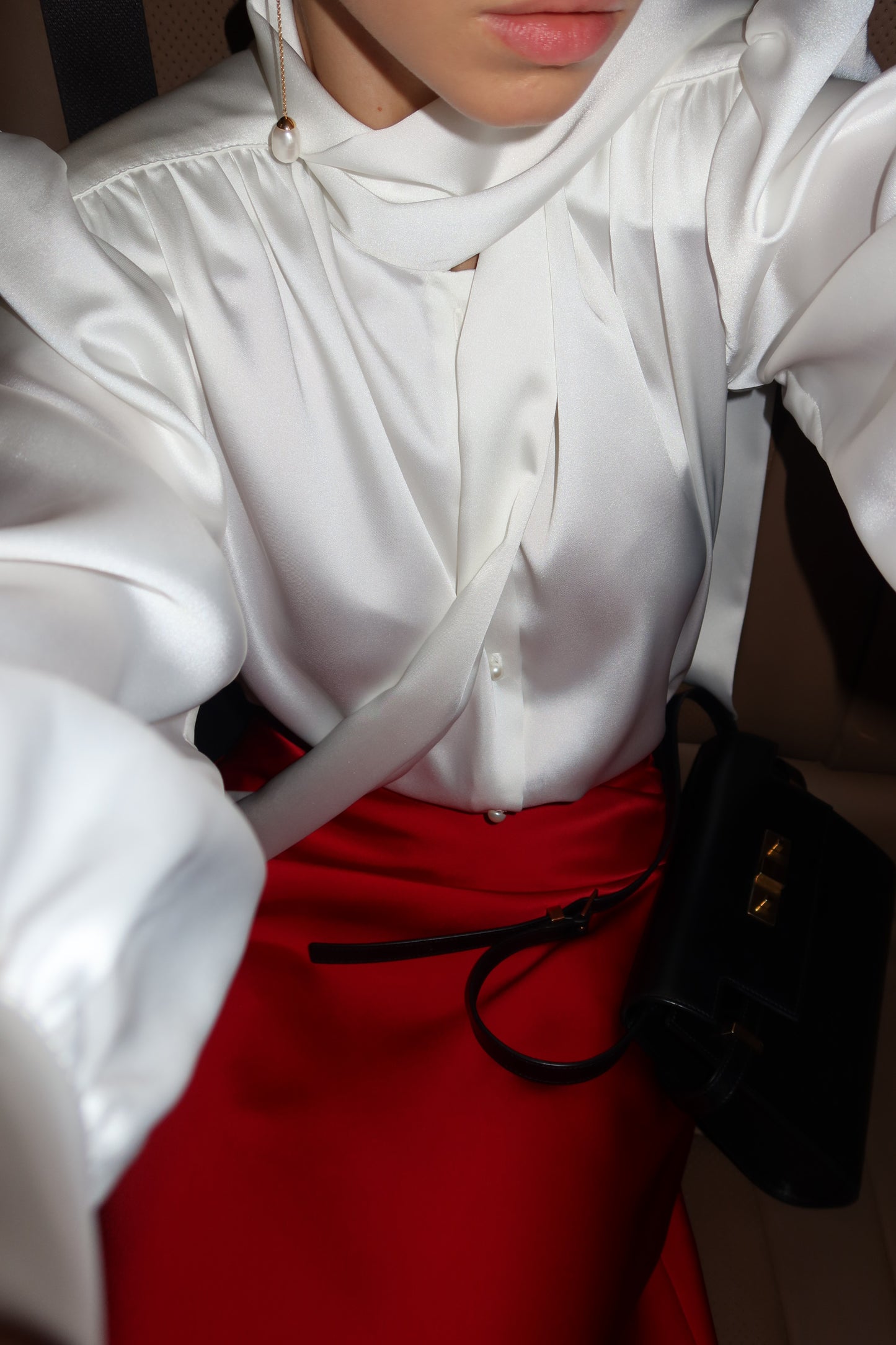 Blouse with accent shoulders and long sleeves with cuffs