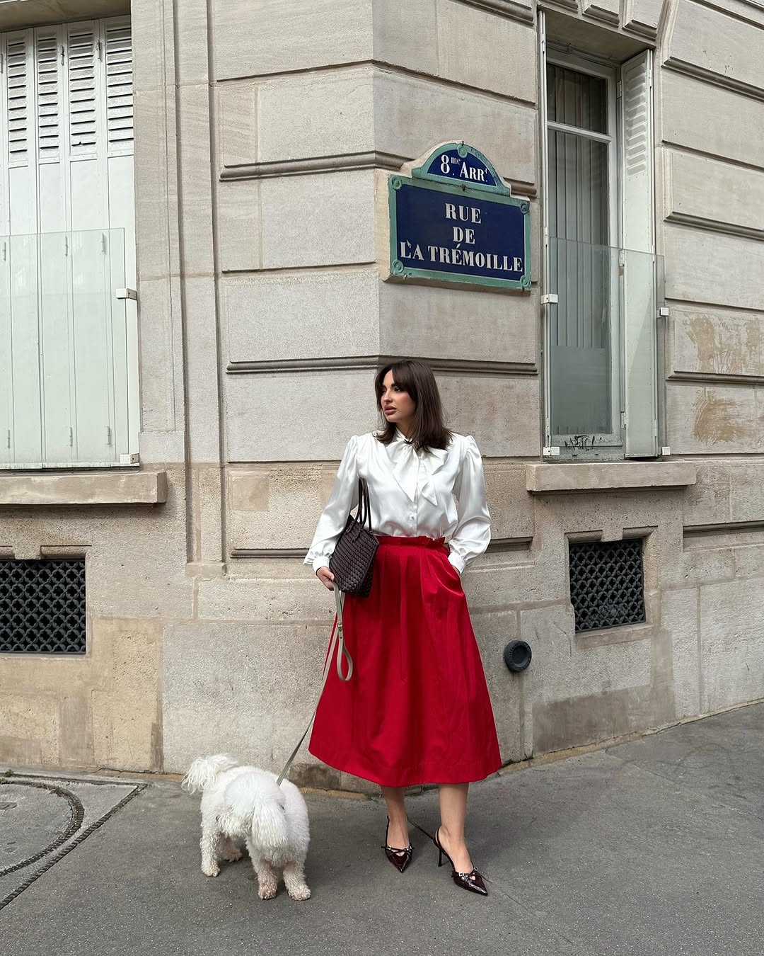 Blouse with accent shoulders and long sleeves with cuffs