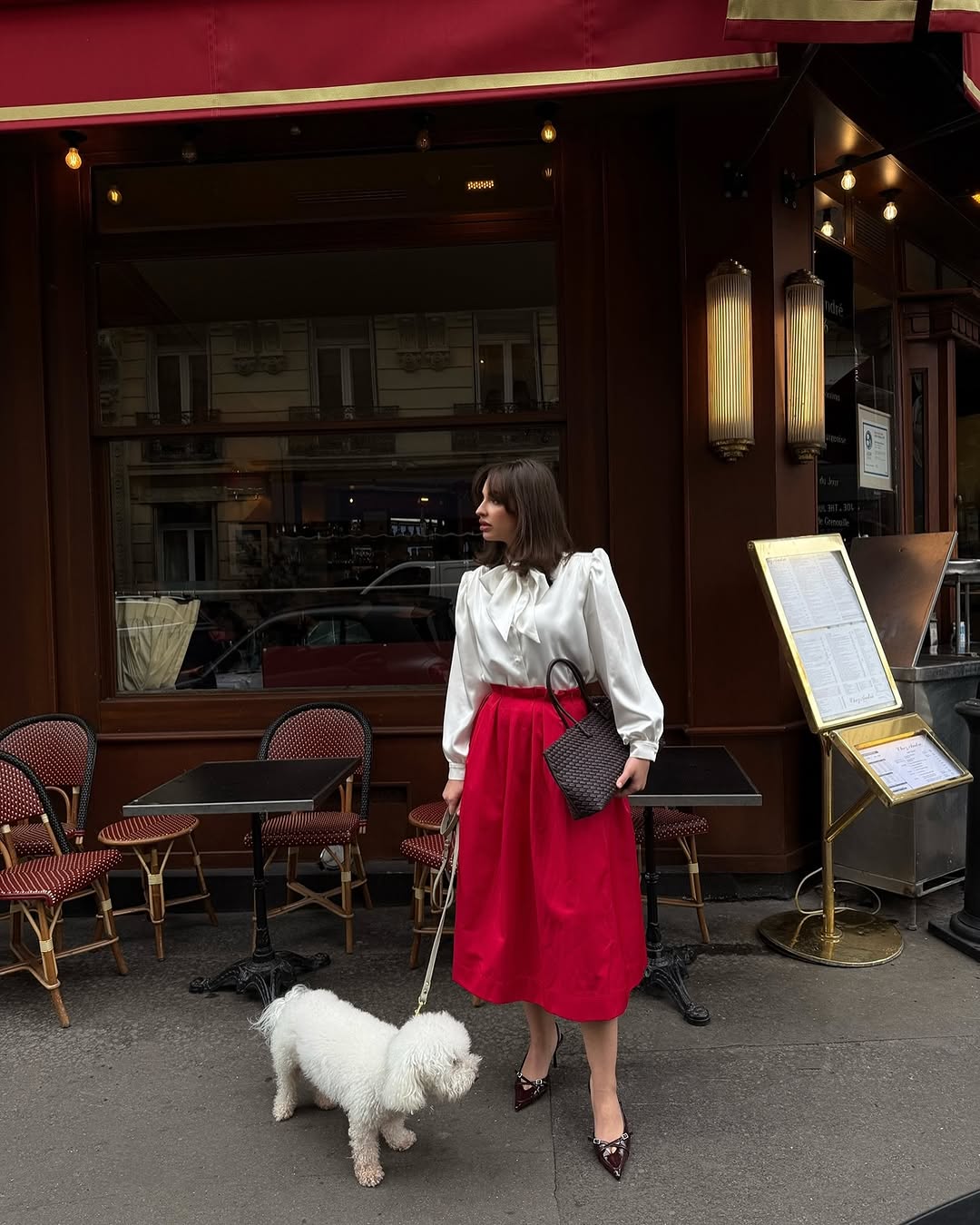 Blouse with accent shoulders and long sleeves with cuffs